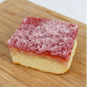 JAM SQUARE – square sponge cake topped with jam and coconut